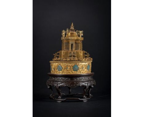 A gilt silver filigree mandala in the shape of a temple on a Zitan wooden standChina, late 19th - 20th century . . Cm 32,00. 