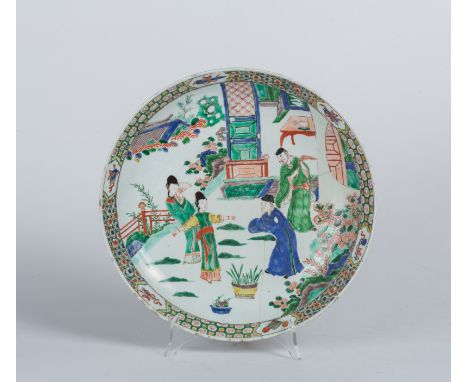 A famille verte porcelain dish painted with ladies and courtesans in the garden China, Qing dynasty, Kangxi period, 18th cent