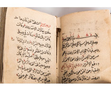 A small religious Arabic manuscript with red leather bindingPossibly India, late 19th century . . Cm 6,50 x 9,50.