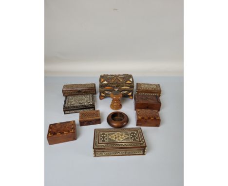 A collection of treen, including trinket boxes, bowls, a turned paperweight, etc (11)