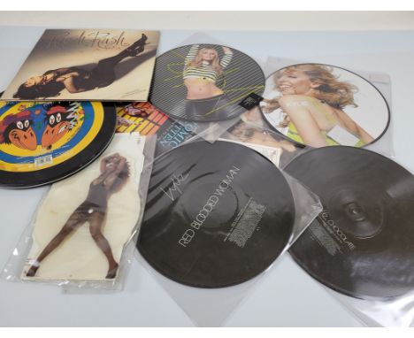 A collection of various artists and picture discs/CDs, including four miniature CDs, picture discs for Tina Turner, Paul Abdu