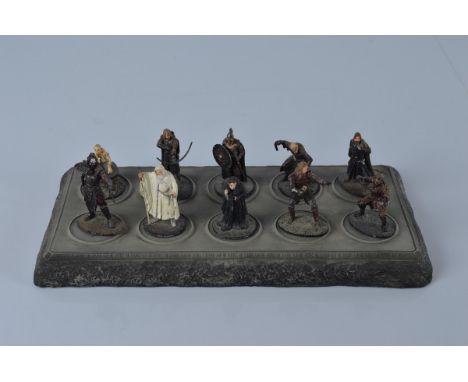 A set of ten Lord of the Rings metal figures with resin display stand, a quantity of mostly DeAgostini part work Harry Potter