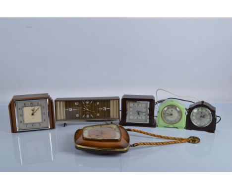 Six wooden and bakelite cased clocks, including Smiths, Rhythm and a German wall clock (6)