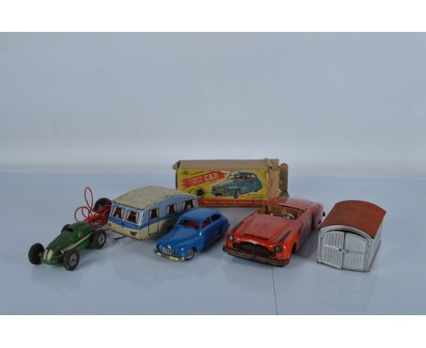 A tinplate JNF Gigant roadster, together with a boxed Chad Valley remote control car, etc (5)