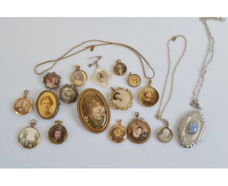 A collection of lockets, mostly open circular design, including an Arts and Crafts example, with simulated oval opal, filled 