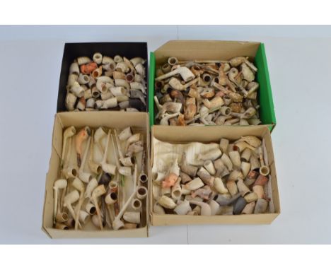 A collection of clay pipes, comprising approx 30 complete examples, with various moulded decoration for the RAOB, Acorn, Dogs