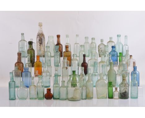 A large collection of miscellaneous 19th century bottles, of various sizes and shapes including a blue Cresswell's &amp; Co. 