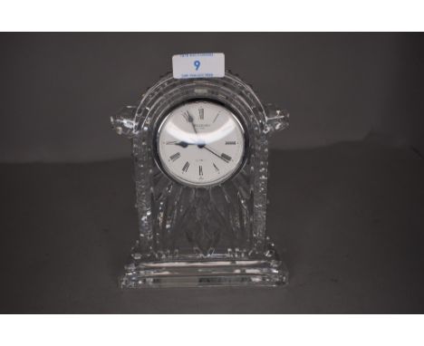 A crystal clear cut glass mantle clock by Waterford with box
in good condition.