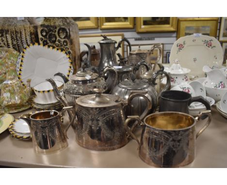 A collection of plated ware and pewter including tea pots, basin and jug.