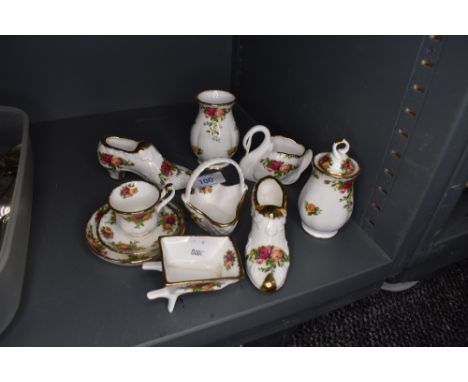 A selection of ceramic decorations by Royal Albert in the Old Country Roses design
