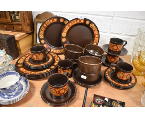 A part tea and dinner service by Kiln Craft in a mid century print