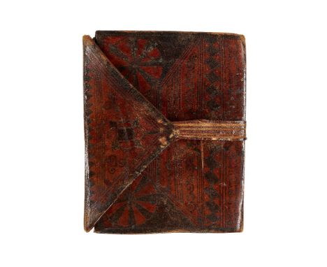 A Sub-Saharan Qur'an, with original leather wrap-around cover, in Arabic, decorated manuscript on paper [probably Sudan, late