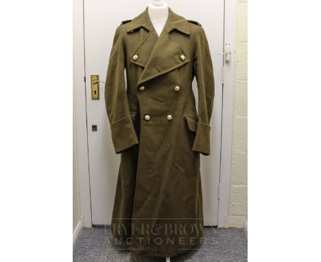 A World War II British Army General's greatcoat, crossed sword & baton, one pip and a crown, khaki, labelled for 15.10.41, Lt