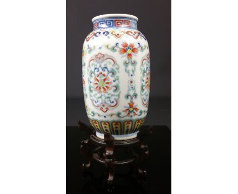 A small fine Chinese porcelain Doucai ovoid vase with Qianlong underglaze blue seal mark, possibly of the period, of ovoid fo