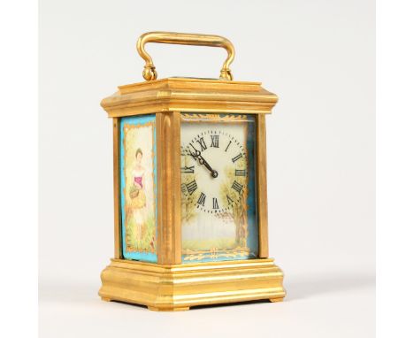 A SEVRES STYLE MINIATURE CARRIAGE CLOCK, with porcelain dial and panels. 3ins high.