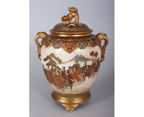 A JAPANESE SATSUMA KORO AND COVER, with lion finial and elephant handles. 8ins high.