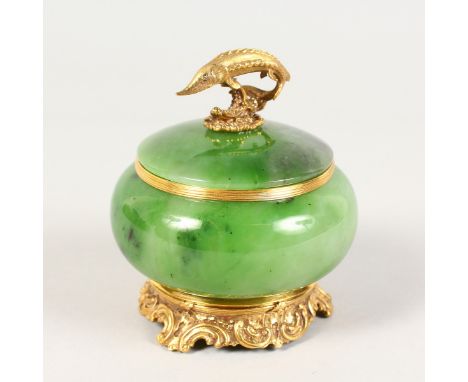 A GOOD RUSSIAN SILVER GILT AND JADE CAVIAR BOWL AND COVER, the handle modelled as a sturgeon with diamond inset eyes, on a sc