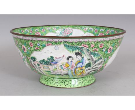 A GOOD QUALITY EARLY 20TH CENTURY CHINESE LIME GREEN GROUND CANTON ENAMEL BOWL, the exterior sides decorated with quatrefoil 