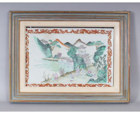 A VERY GOOD 18TH CENTURY CHINESE RECTANGULAR PORCELAIN PANEL, with figures in relief, beside a lake with trees, framed. 10ins