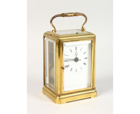A GOOD 19TH CENTURY BRASS GRANDE SONNERIE CARRIAGE CLOCK, with alarm, two bells and three hammers. 5.5ins high.