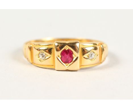 AN 18CT GOLD, DIAMOND AND RUBY RING.