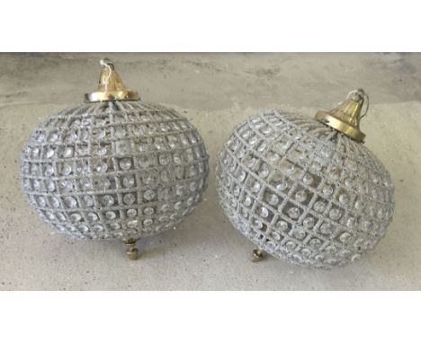 A pair of ball shaped chandelier style lampshades with glass beads and brass fittings. Approx 30 x 35cm.