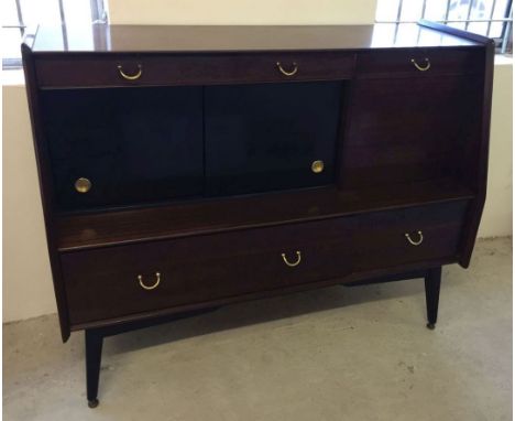 A G plan "Tola" sideboard with sliding door cupboard and glass shelf.