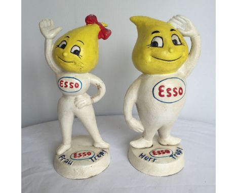 A pair of cast iron reproduction Esso money banks.