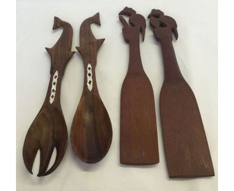 4 carved wooden South Pacific spoons, 2 with mother of pearl inlay from the Soloman Islands and 2 with Toucan decoration from