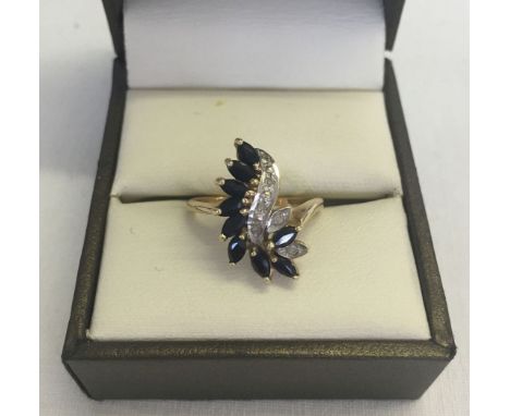 A 9ct gold sapphire & diamond ring. Size K. Total weight approx 2.5g.