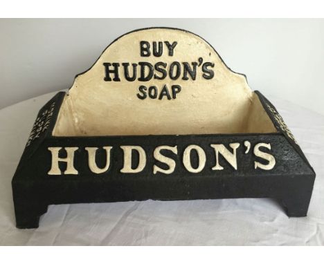 A cast iron 'Hudsons Soap' dog water trough