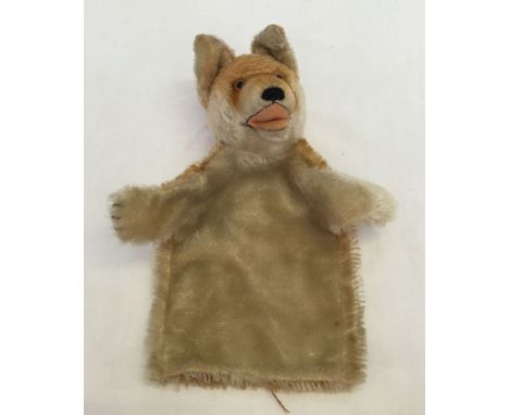 A German fox glove puppet made from mohair with straw filled head.  Glass eyes, hand stitched nose and claws. Approx 24cm tal