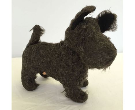 A mid 1950's dark brown Chiltern dog. Approx 8 inches tall x 9.5 inches long.