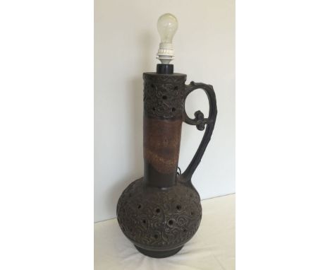 A large West German Lamp in brown glaze 63cm tall.