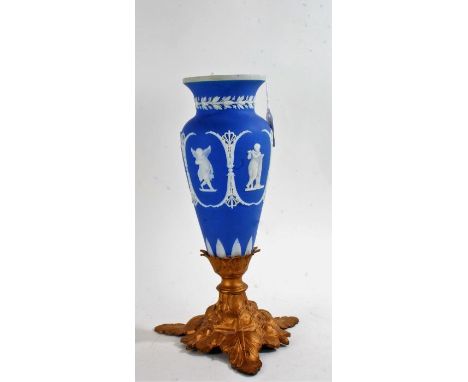 19th century Wedgwood blue jasperware vase, circa 1835, of ovoid form, decorated with putti playing musical instruments, rais