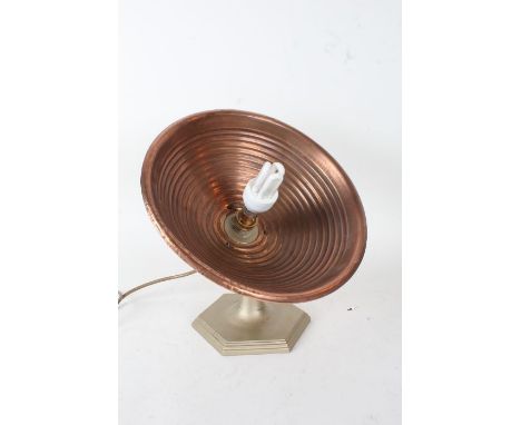 Art Deco copper table lamp, with ribbed copper shade raised on hexagonal cast metal base, 31cm diameter