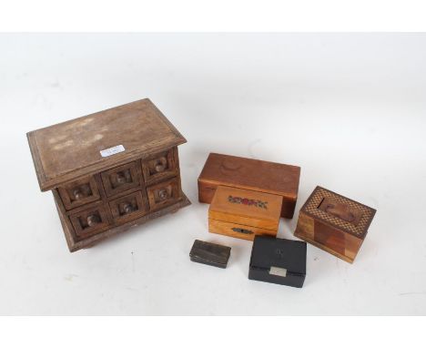 19th century horn snuff box, together with a specimen wood money box, two other wooden boxes, a small leather box mounted wit