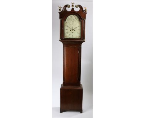 Late George III oak eight day longcase clock, the hood with scrolled pediment surmounted by three brass bird finials above an