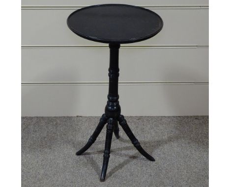 A Victorian Aesthetic ebonised wine table on ring turned base, 15" across 