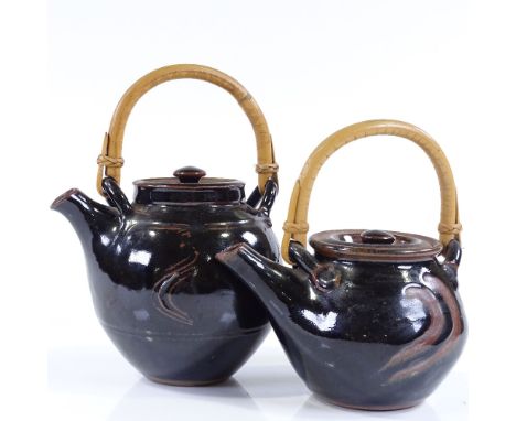 A Jim Malone Tenmoku glaze teapot with cane handle, impressed maker's marks, and another teapot, unmarked (2) 