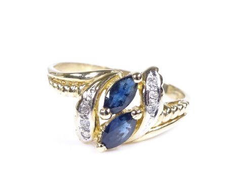 A 14ct gold sapphire and diamond dress ring, setting height 11.6mm, size N, 2.6g 