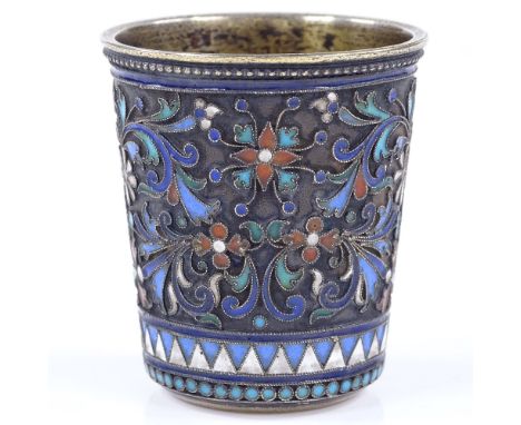 A 19th century small Russian silver and enamel drinking tot, with floral design champleve enamel decoration and reeded border