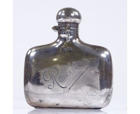 A curved silver hip flask, by G &amp; JW Hawksley, hallmarks Sheffield 1918, height 9cm 