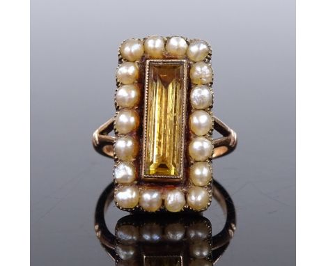 A 9ct gold citrine and pearl tablet ring, with long rectangular-cut central citrine surrounded by row of split pearls, panel 