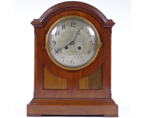 A mahogany 8-day dome-top mantel clock, circa 1920, with silvered dial, case height 34cm 