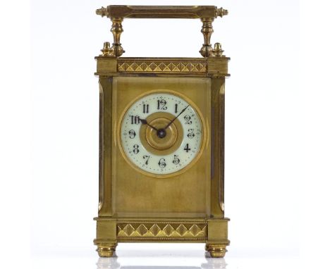 A French brass-cased carriage clock with geometric bands, case height 11.5cm, working order 