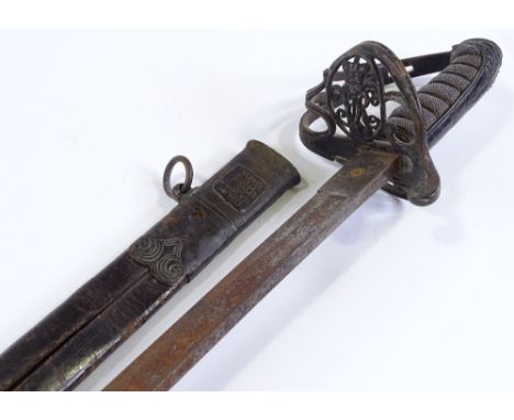 A Victorian Military Officer's dress sword, etched blade with indistinct maker's marks, brass basket hilt with shagreen grips