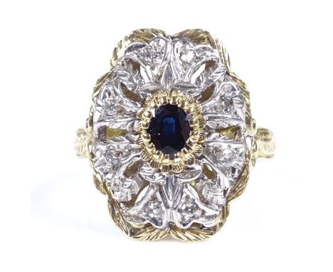 An 18ct gold sapphire and diamond cluster dress ring, with ornate pierced settings and engraved shank, setting height 18.7mm,