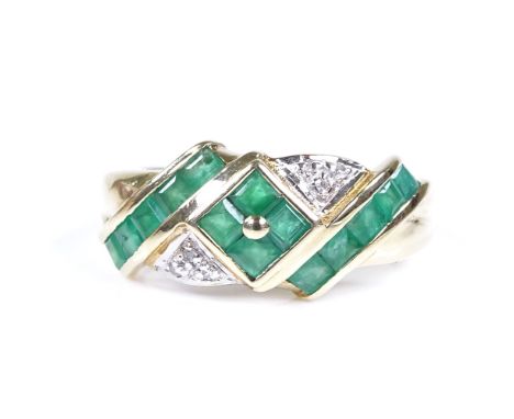 A 9ct gold emerald and diamond dress ring, setting height 8.3mm, size O, 2.5g 