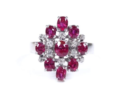 An 18ct white gold ruby and diamond cluster cocktail ring, setting height 17.6mm, size Q, 5.7g 